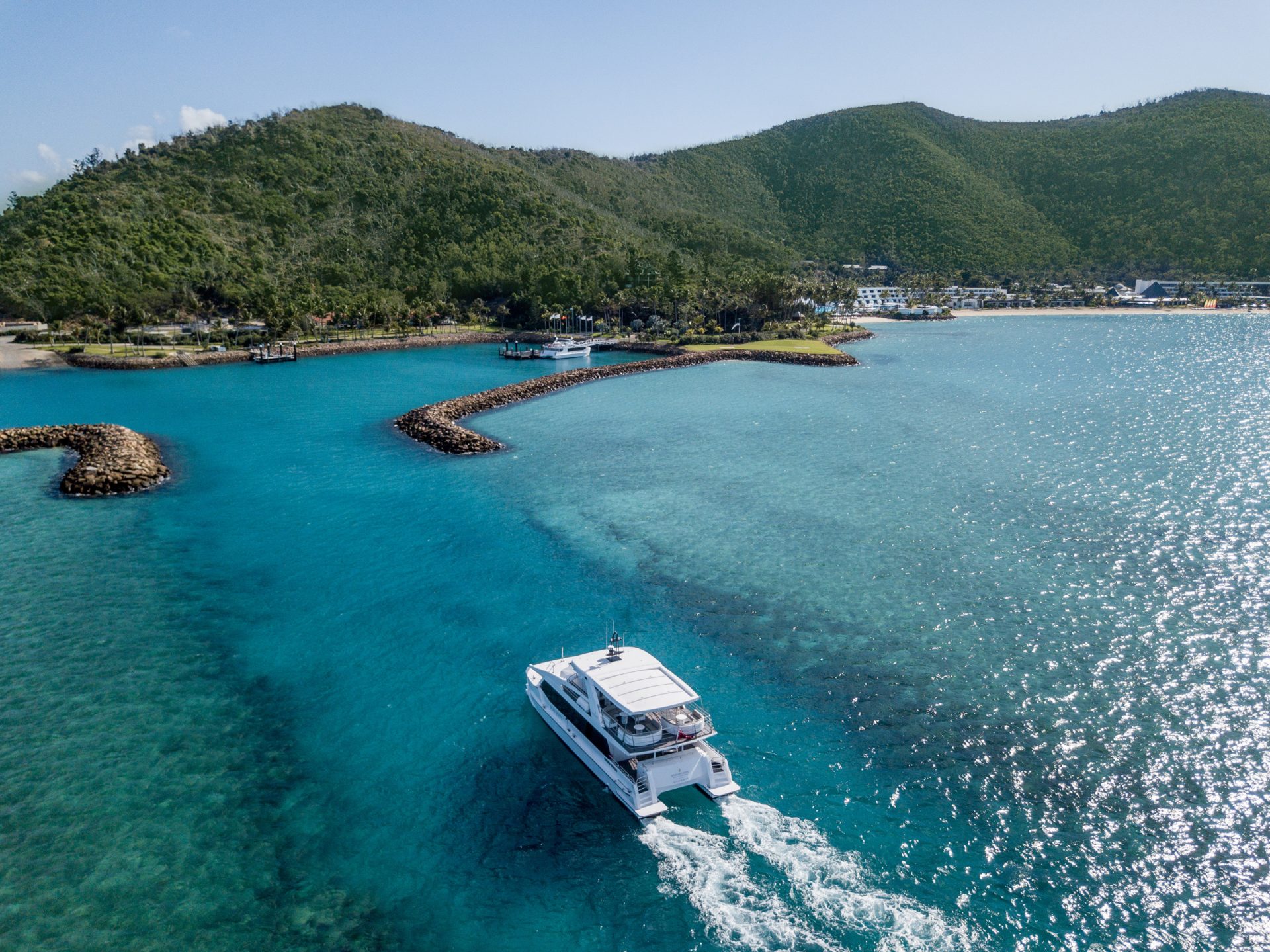 Luxury yacht approaching Hayman Island through the Whitsunday Islands